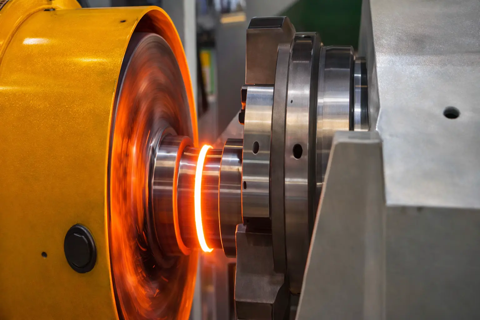 Friction welding process — glowing heat at the pin-to-link weld interface
